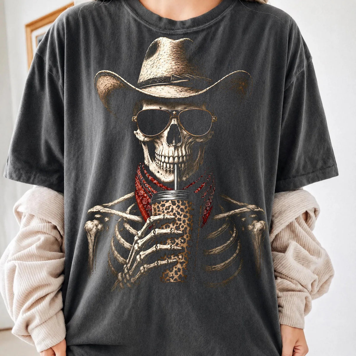 Meet our Cowboy Skelly Graphic shirt— serving Western attitude with a spooky twist.